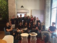 Image may contain: 15 people, people sitting, table and indoor